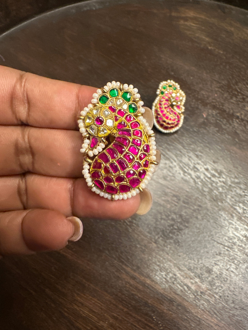 Jadu peacock studs