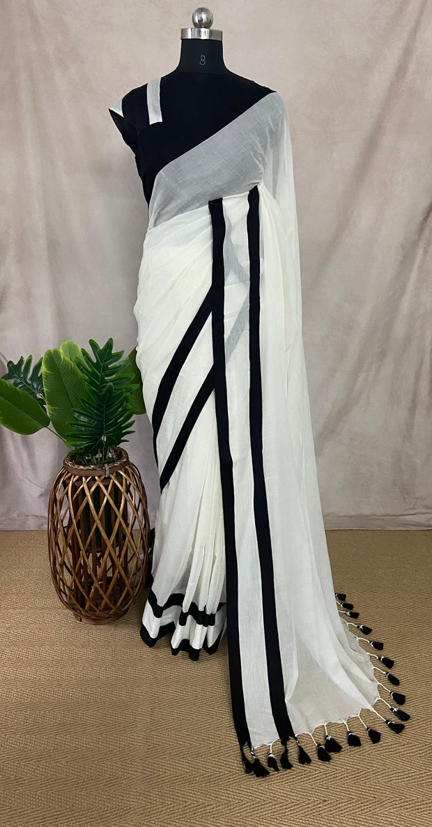 White mulcotton saree with Black satin border
