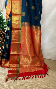 Peacock blue and red Kanchivaram saree with stitched blouse
