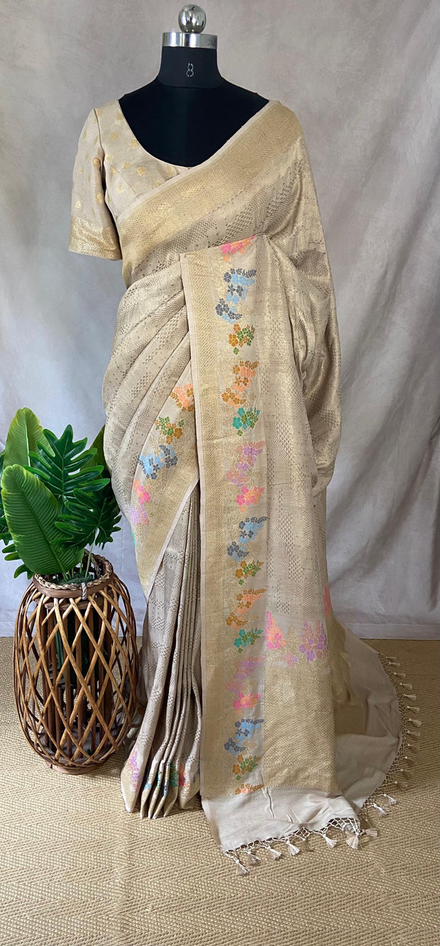 Beige tussar brocade saree with meenakari weave, stitched blluse