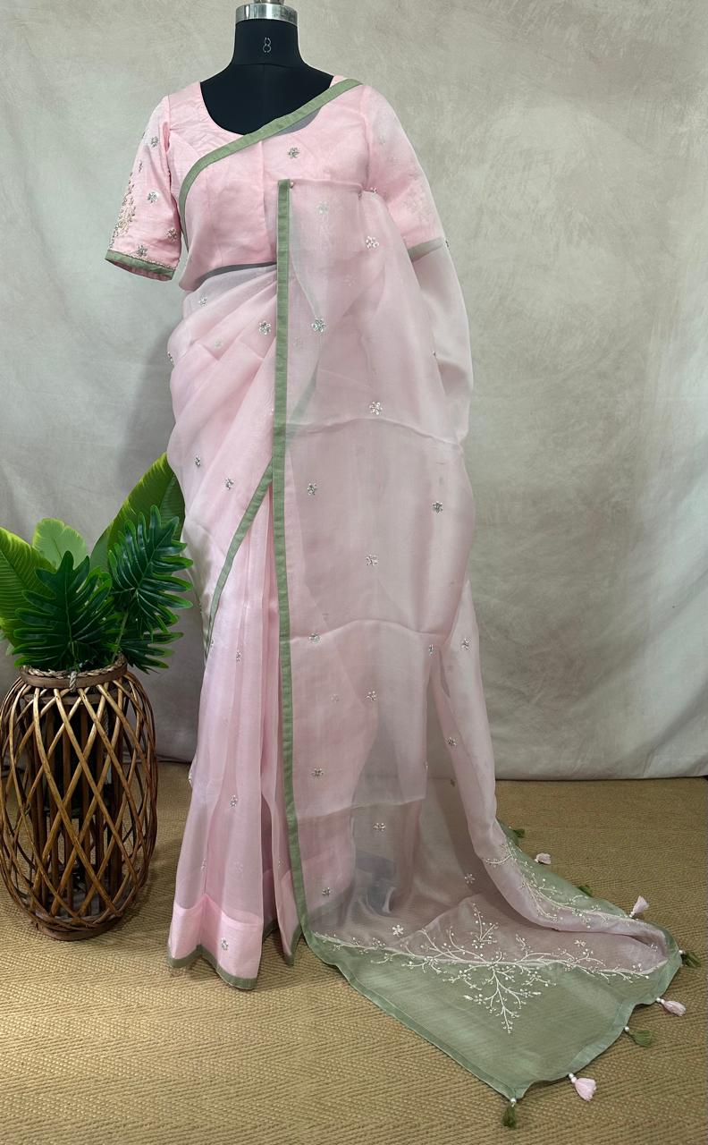 Pastel pink and green designer organza saree with stitched blouse