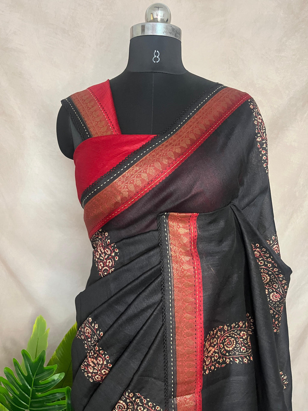 Black and red blended tussar silk saree the block print and highlighted with embroidery, with BP
