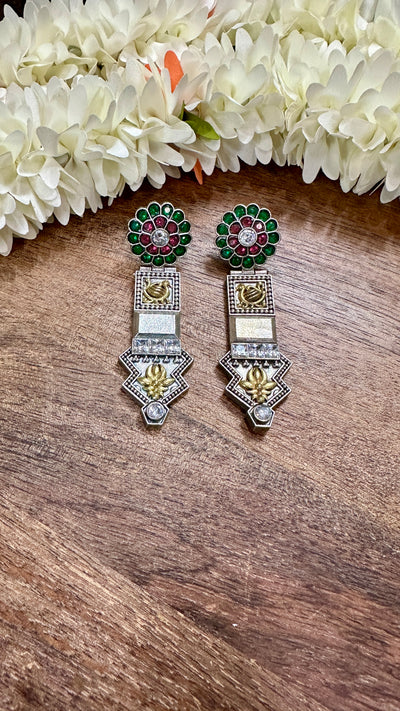 Long earring with red and green stones