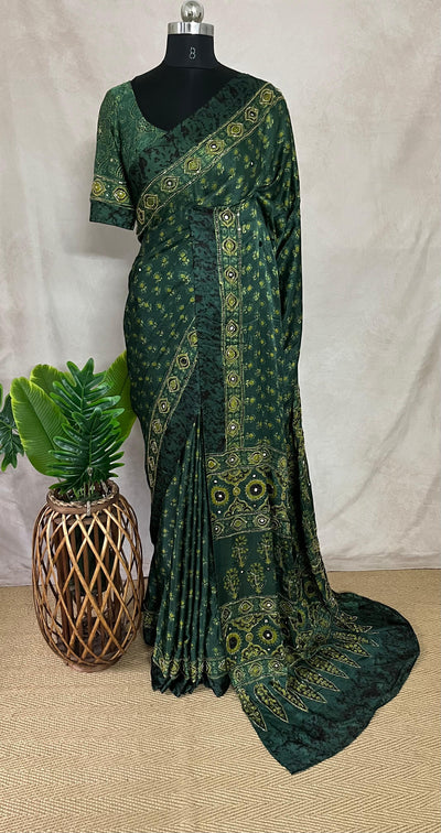 Green modal silk saree with hand work and stitched blouse