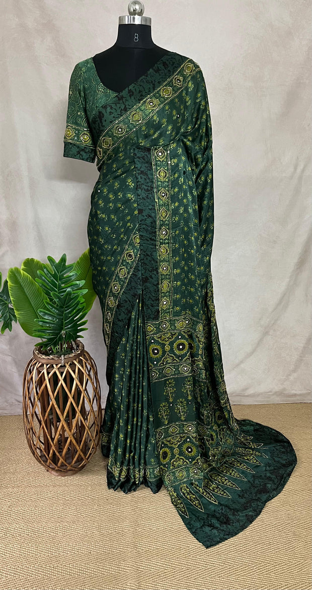 Green modal silk saree with hand work and stitched blouse