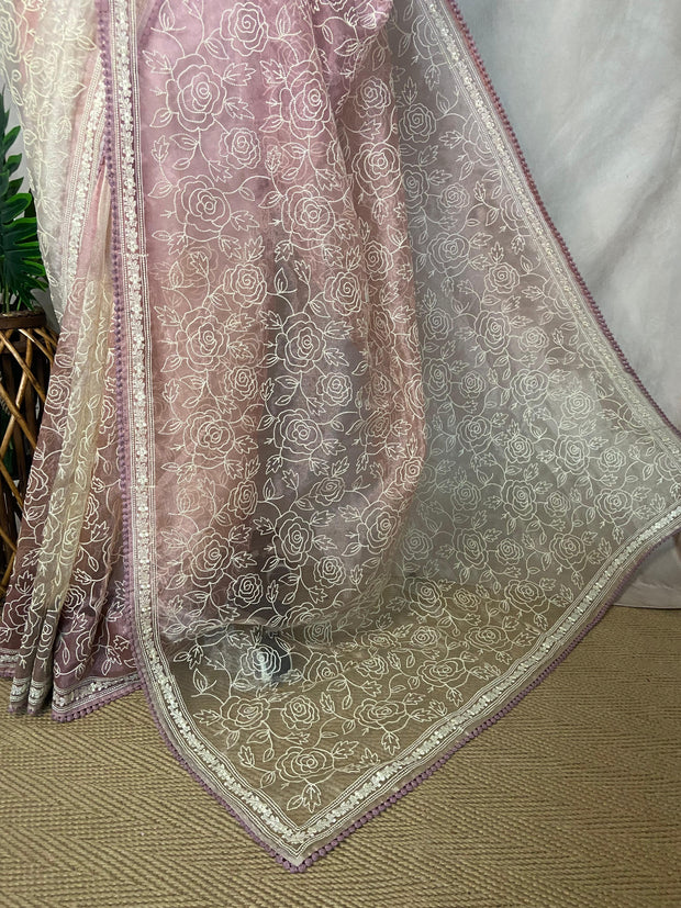 Pink Organza saree with embroidery and stitched blouse