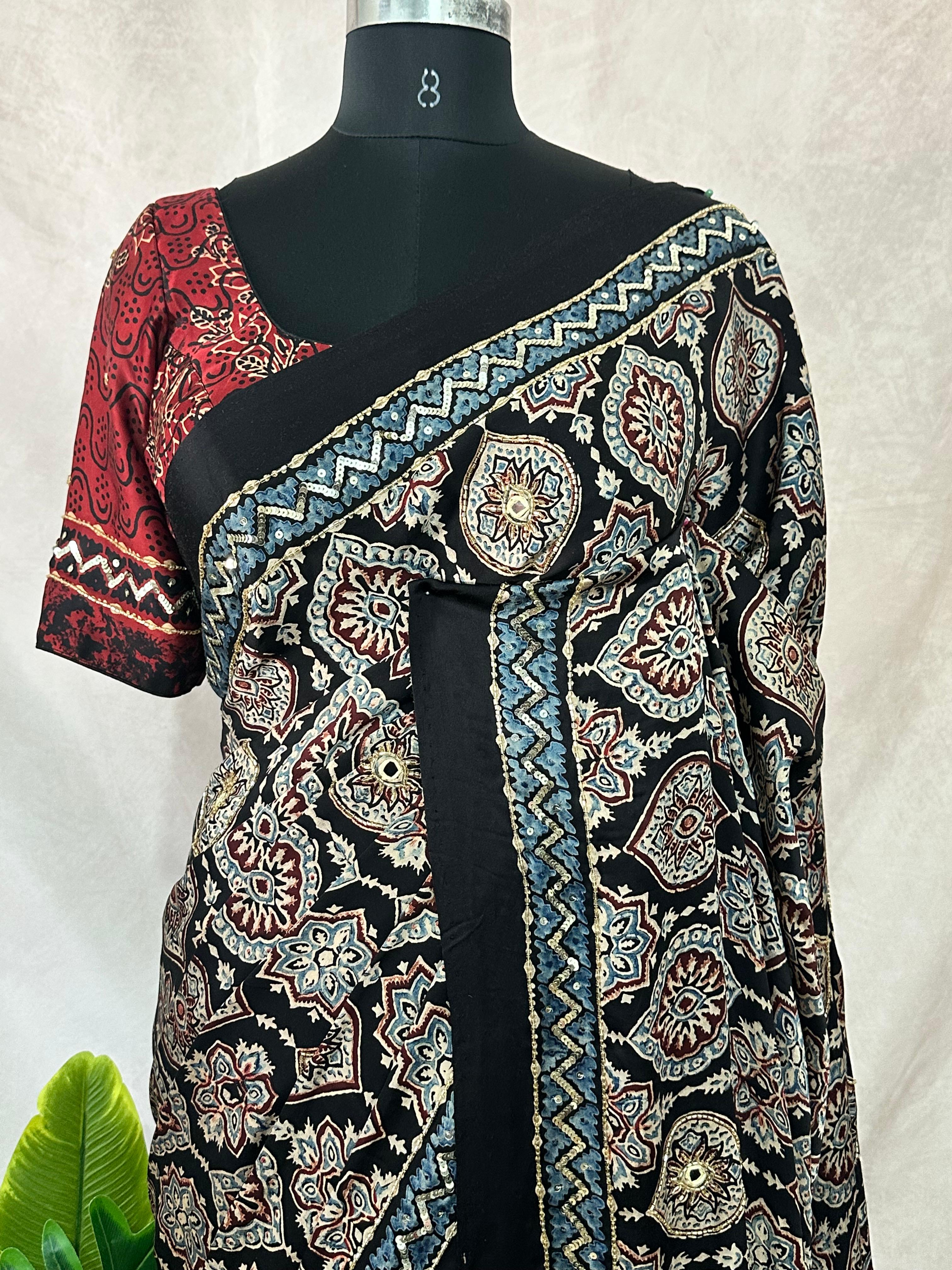 Designer Ajrakh modal silk saree with bead and mirroer handwork, stitched blouse