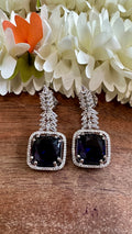 Earring with purple stone