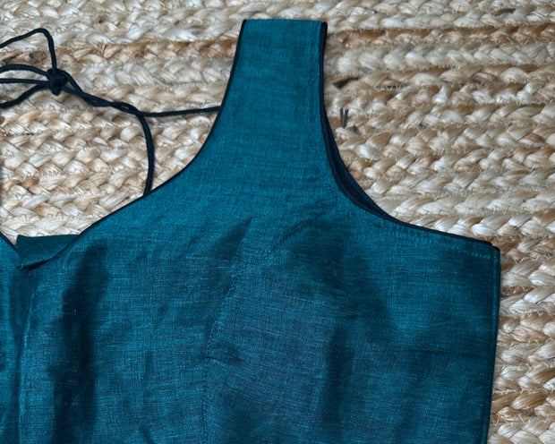 Green cotton sleeveless blouse