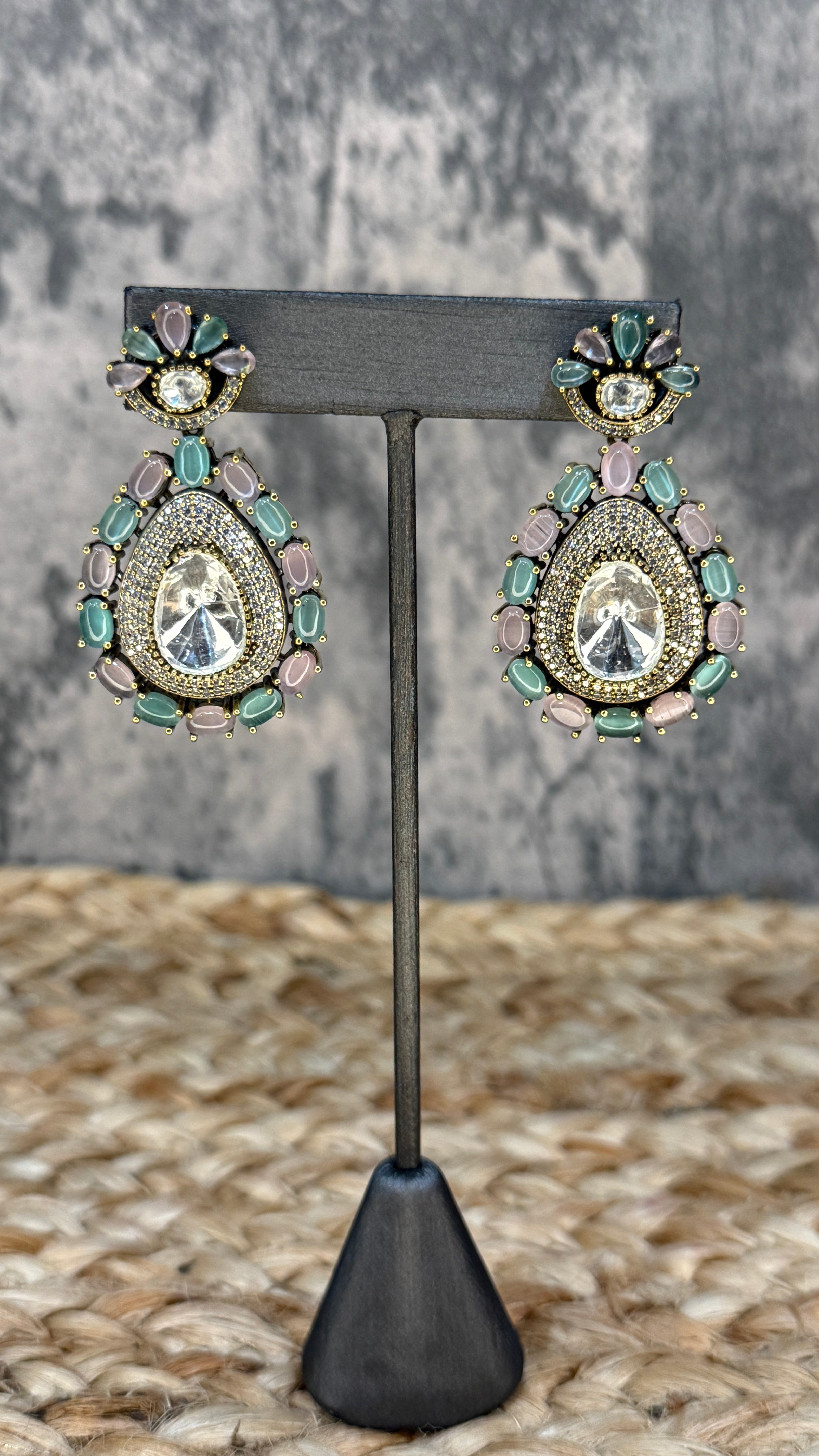 Earring with pastal pink and blue stones