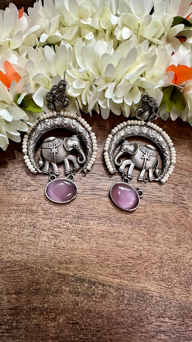 Silver replica with elephant motives and Pink semi precious stone