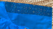 Blue raw silk blouse
