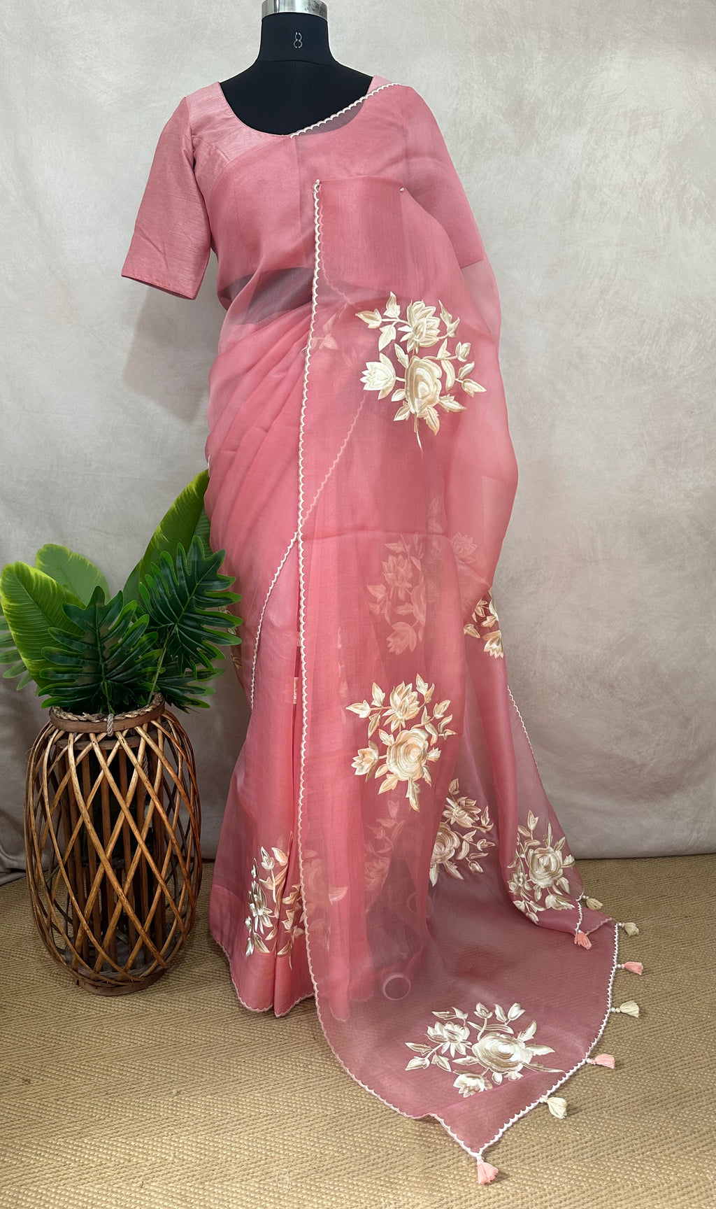 Dusty pink organza saree with thred embroidery and stitched blouse