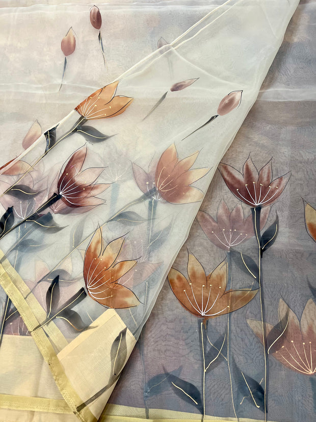 Hand painted off white  organza saree