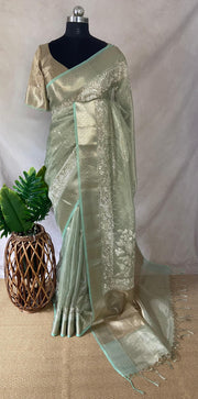 Light green Tissue Kotta silk saree with mirror and chikankari work, with stitched blouse