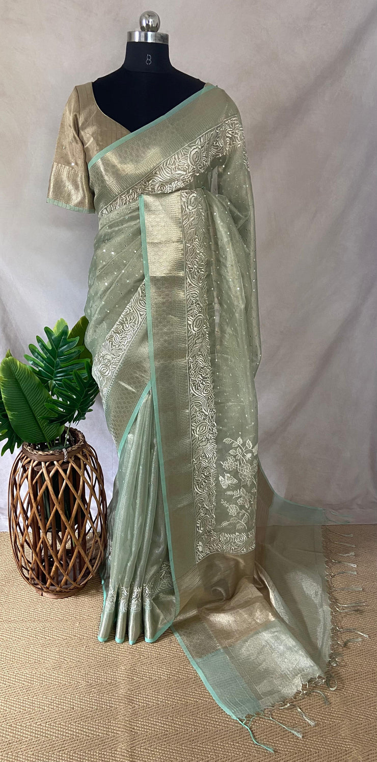 Light green Tissue Kotta silk saree with mirror and chikankari work, with stitched blouse
