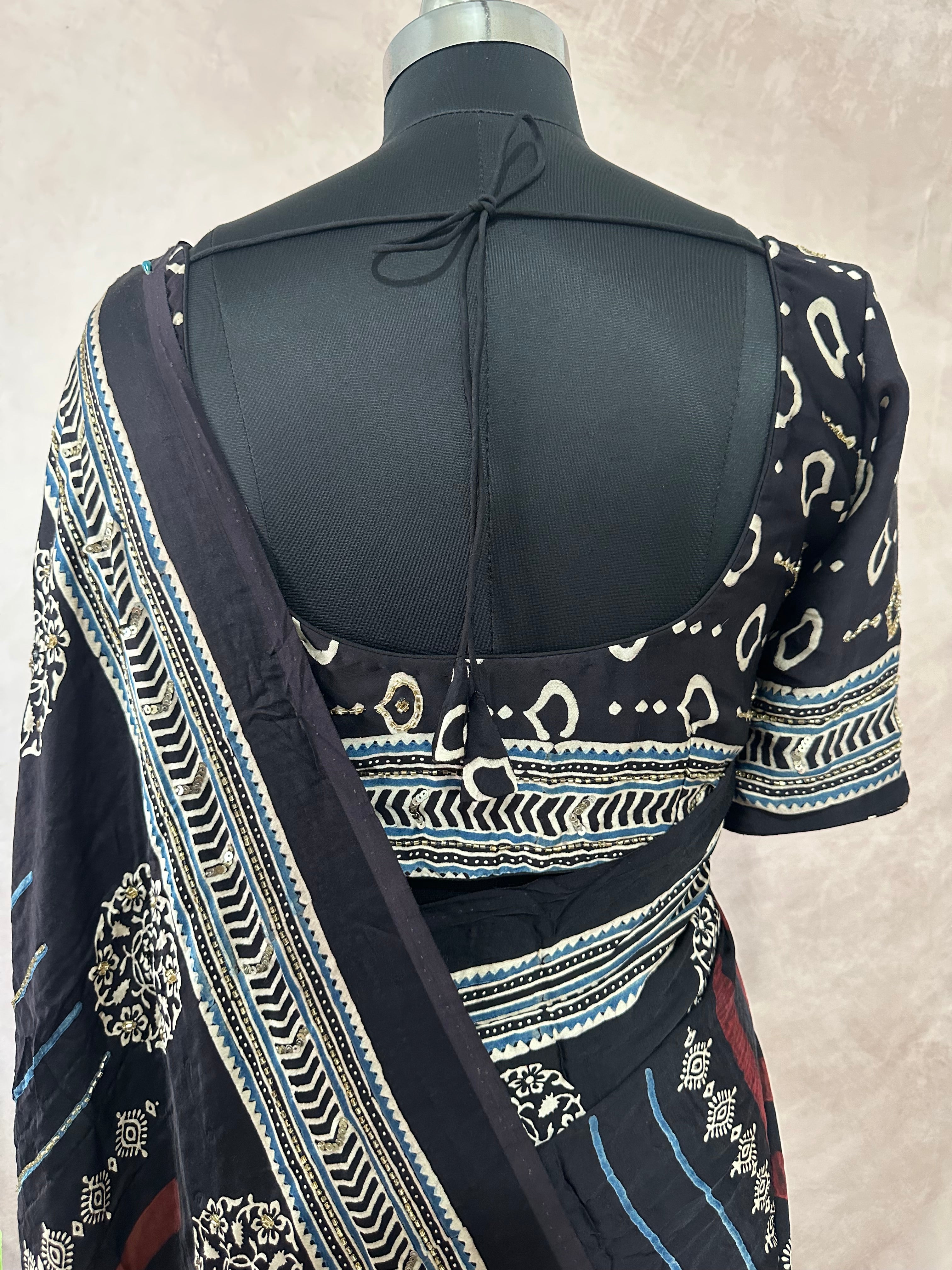 Modal silk saree with bead and mirror work , stitched blouse