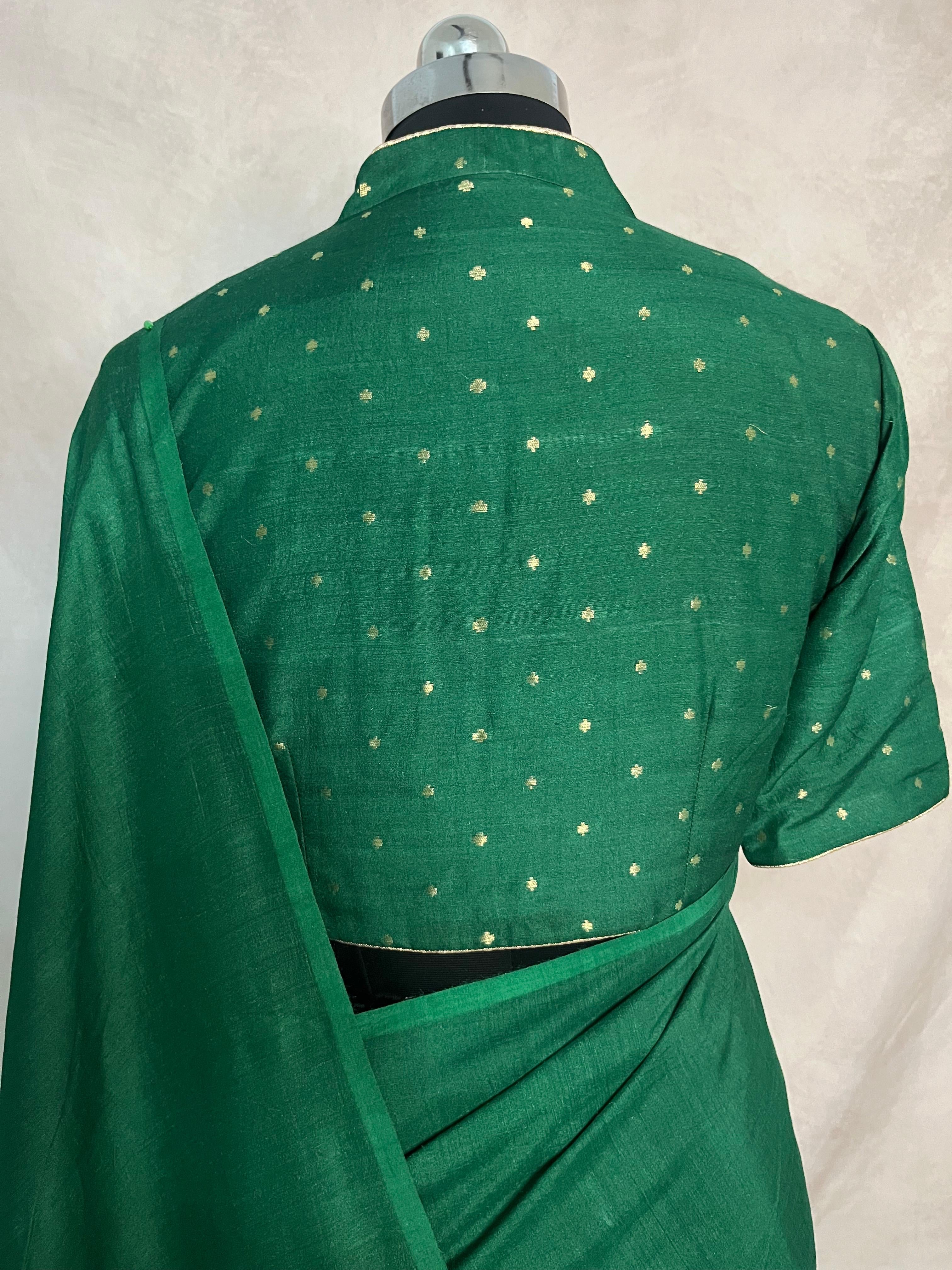 Bottle green munga tussar silk saree with designer pallu and stitched blouse