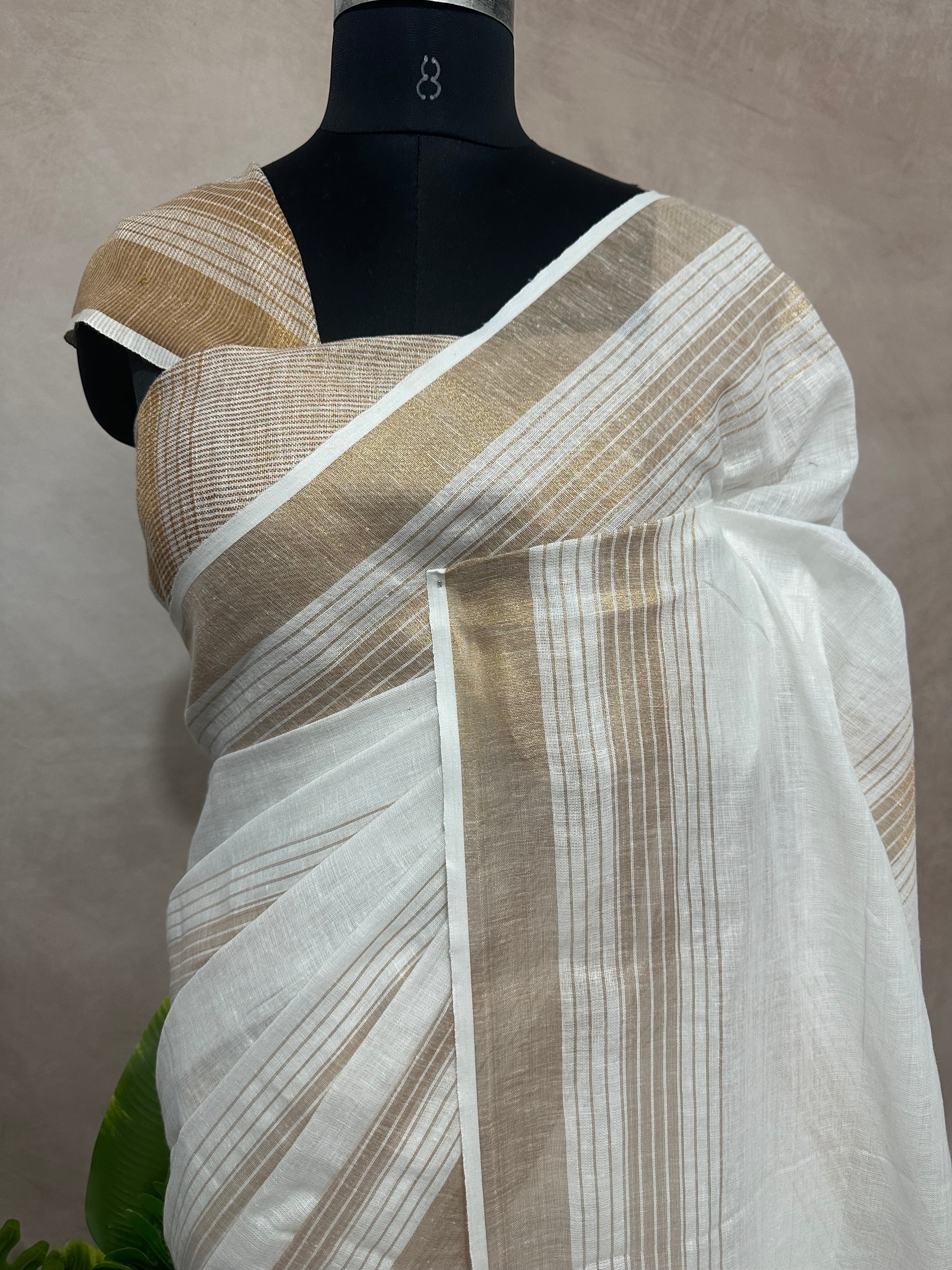 Linen saree with gold border