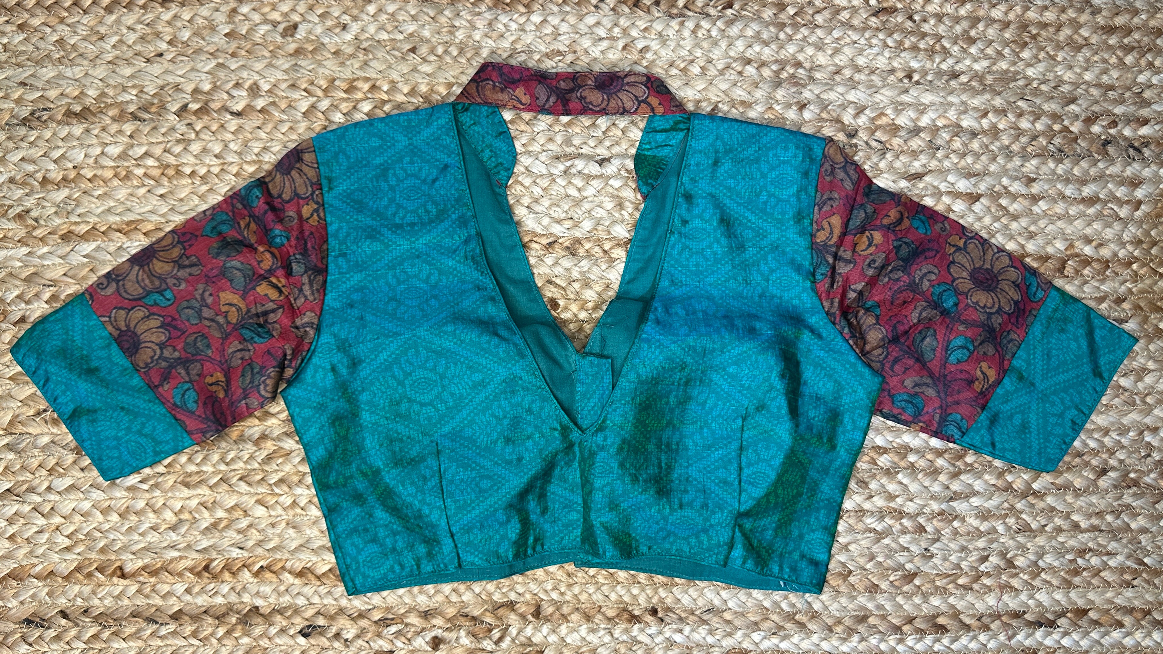 Peacock green silk blouse
