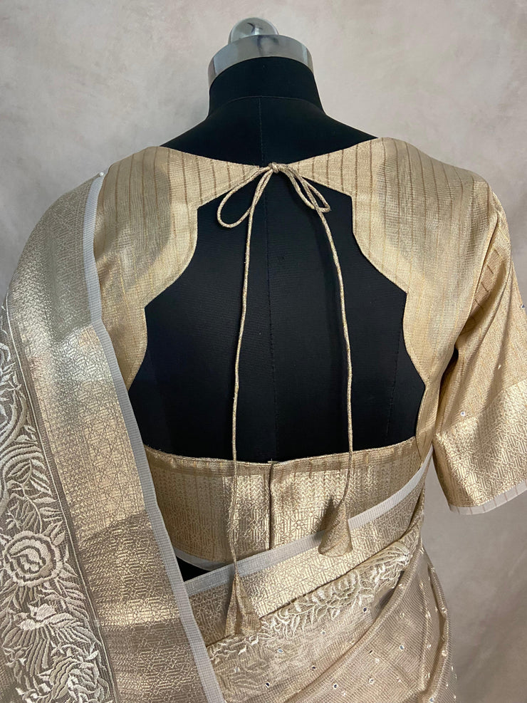 Beige Tissue Kotta silk saree with mirror and chikankari work, with stitched blouse