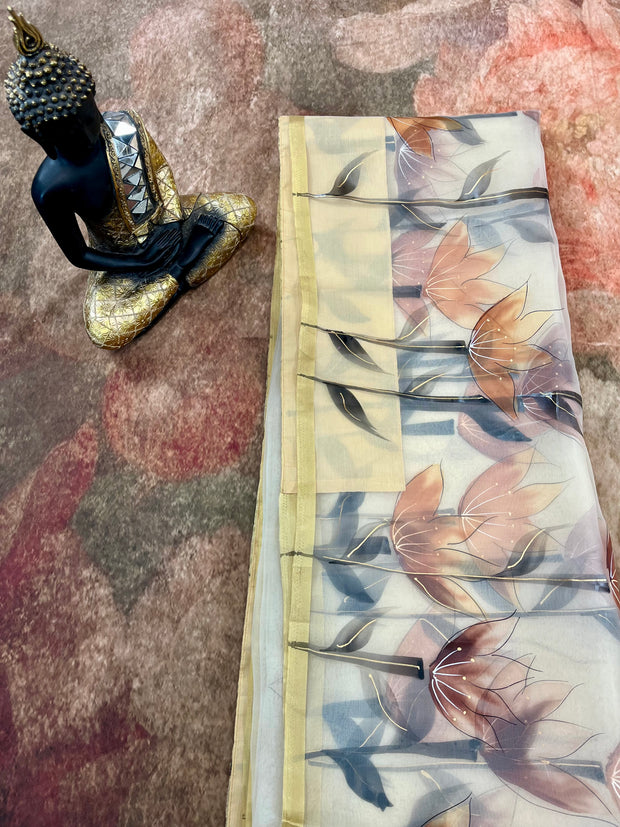 Hand painted off white  organza saree