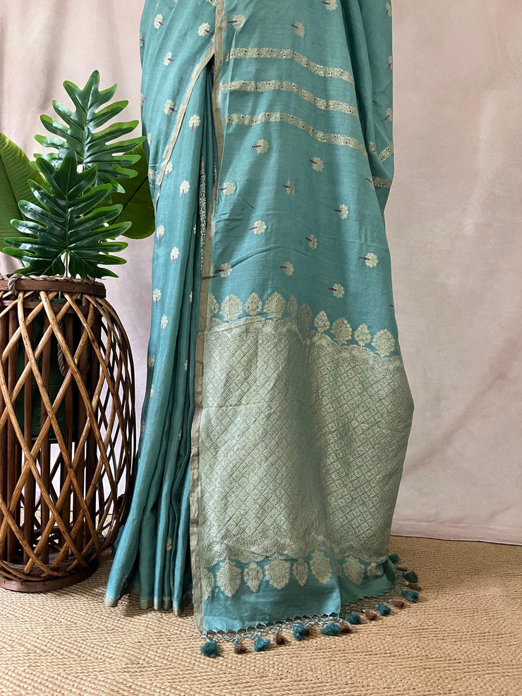 Pastel blue designer tussar georgette saree with meenakari weave , stitched blouse