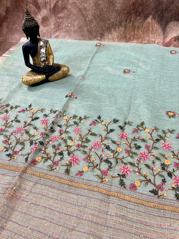 Pista green tissue linen saree with hand embroidery , stitched blouse