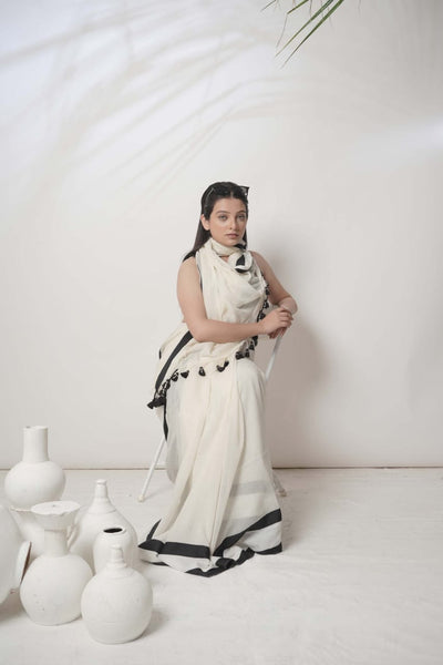 White mulcotton saree with Black satin border