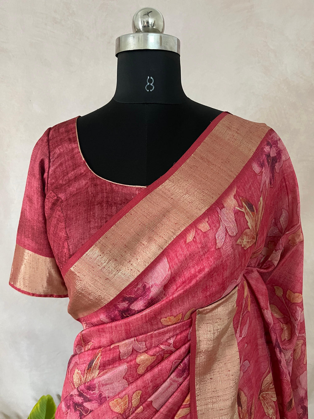 Pink semi soft tussar silk saree with floral print, with stitched blouse