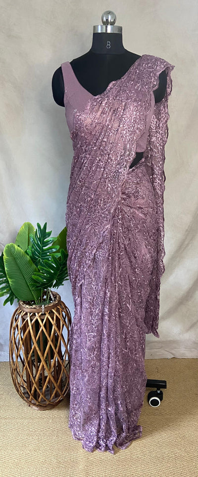 Lilac ready made saree in superior quality lace, with stitched blouse