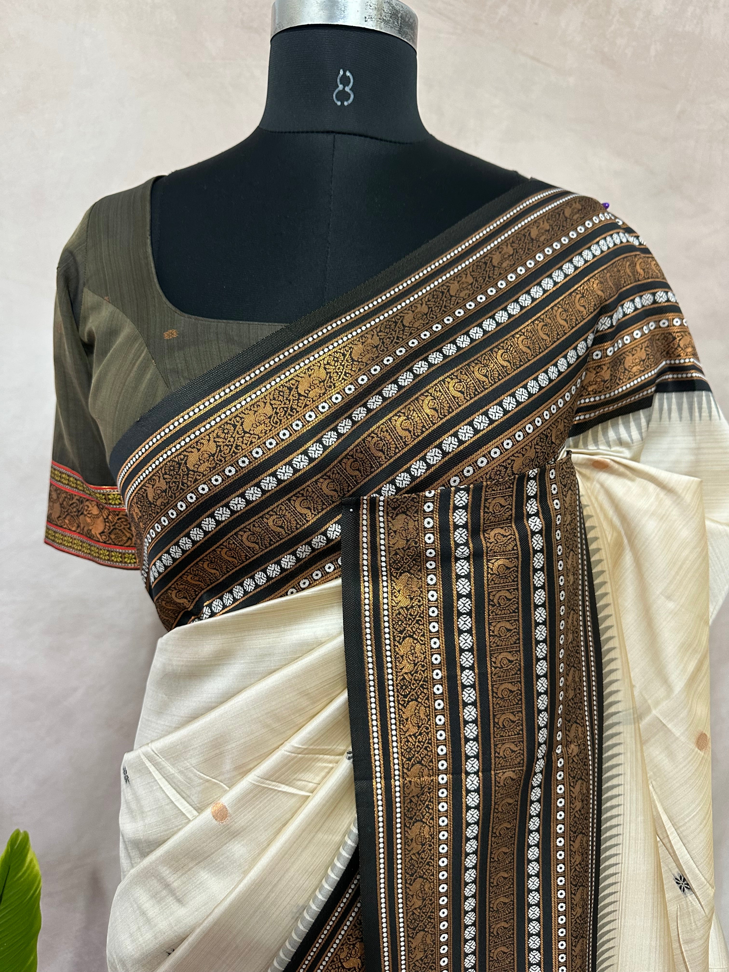 Asam silk saree with brown broder and stitched blouse