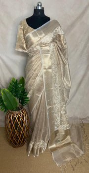 Beige Tissue Kotta silk saree with mirror and chikankari work, with stitched blouse