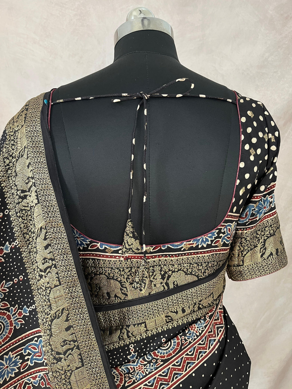 Ajrakh hand block printed premium dola silk saree with stitched blouse