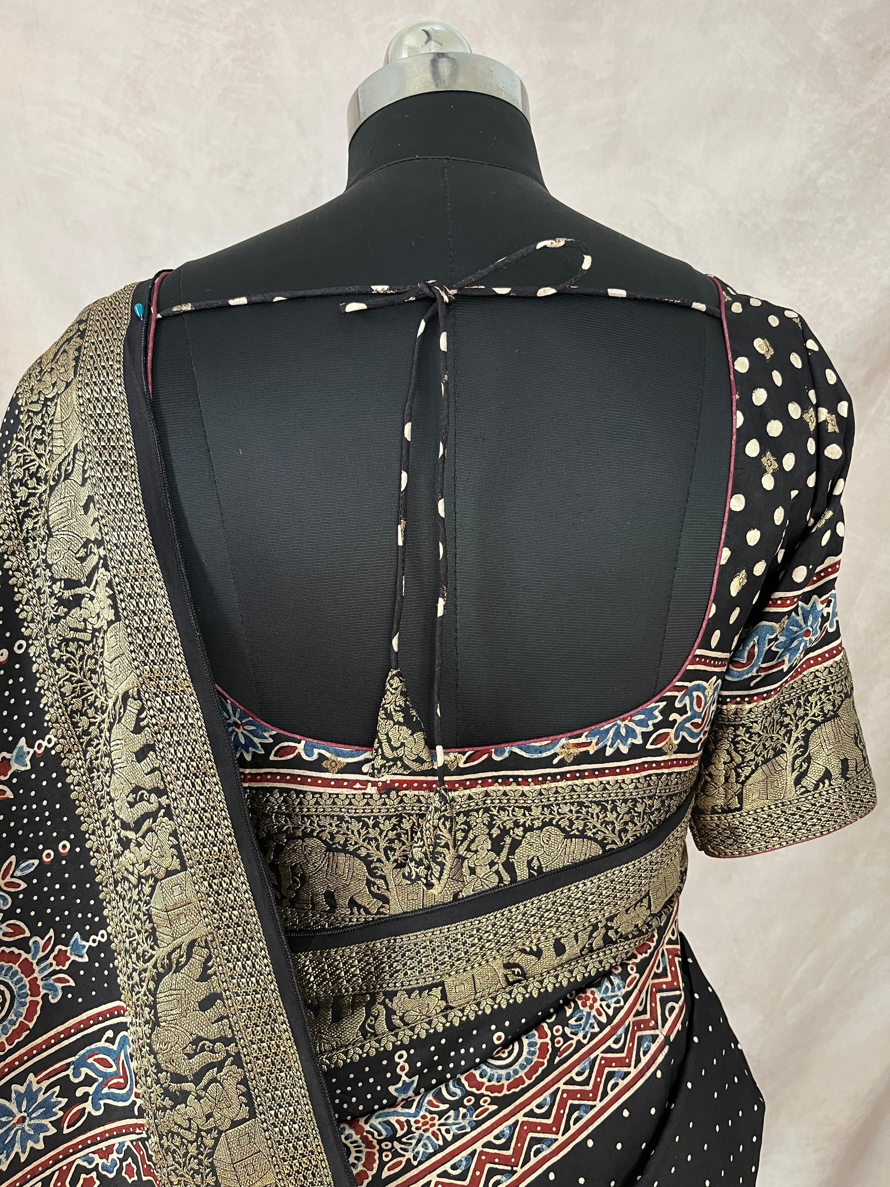 Ajrakh hand block printed premium dola silk saree with stitched blouse