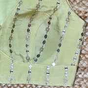 Yellow silk sleeveless blouse