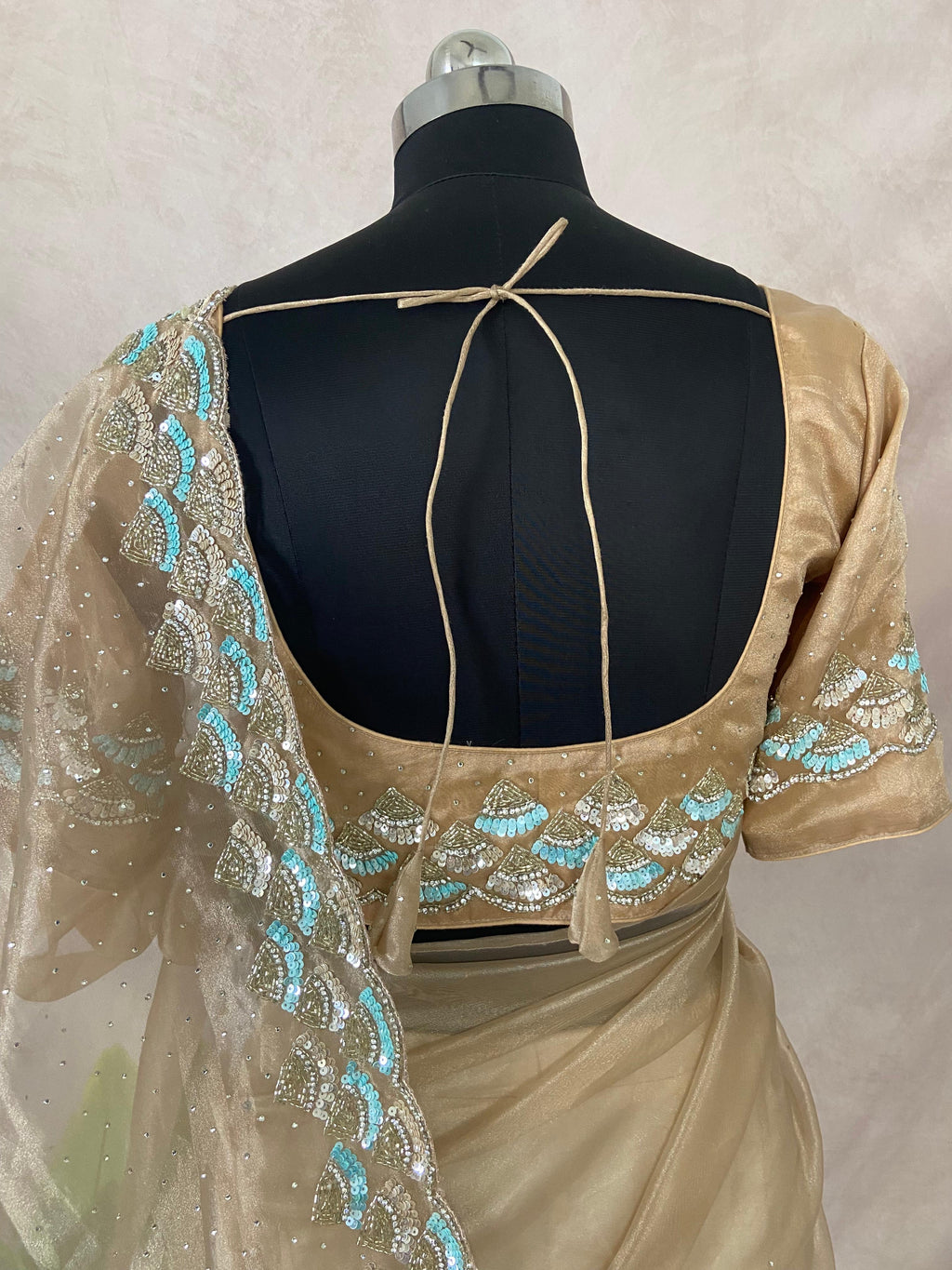 Beige organza saree with Stiched blouse