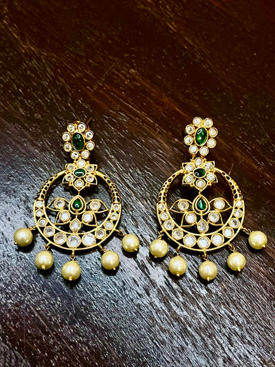 Earring with green stones