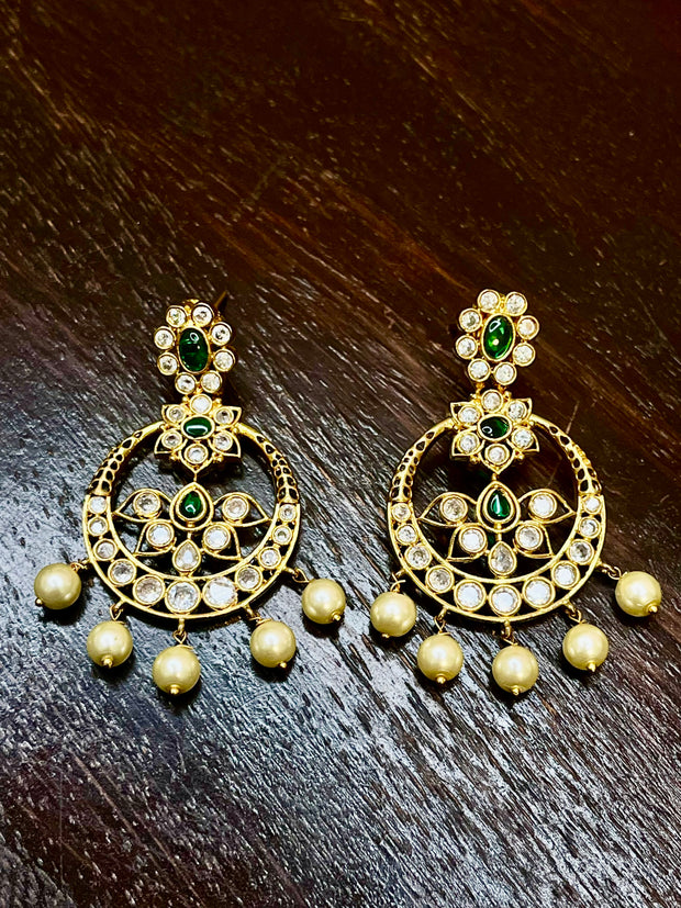 Earring with green stones