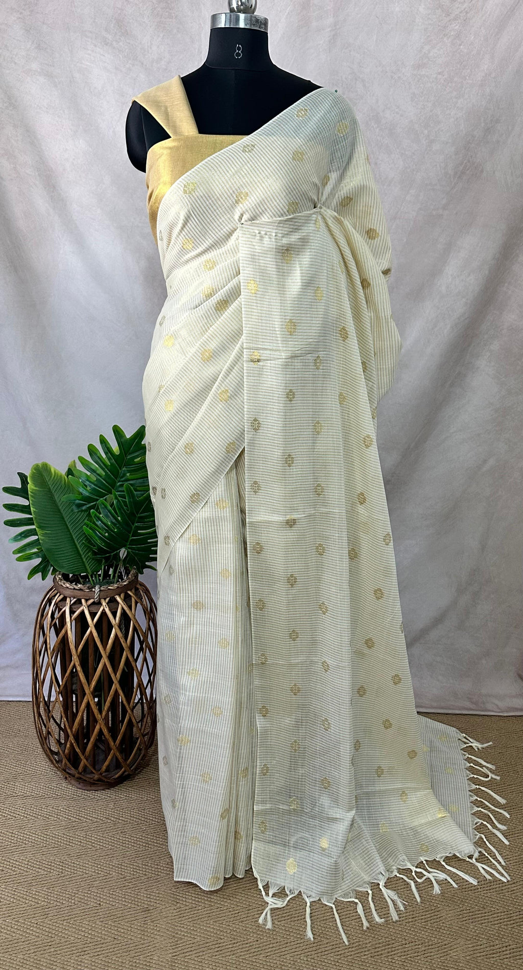 Off white soft tissue cotton saree with floral butta