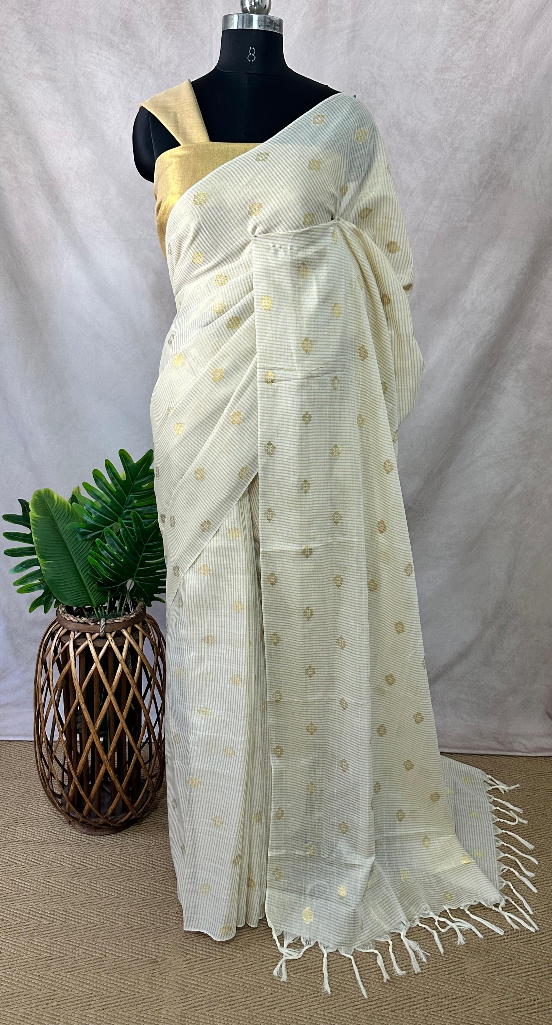 Off white soft tissue cotton saree with floral butta