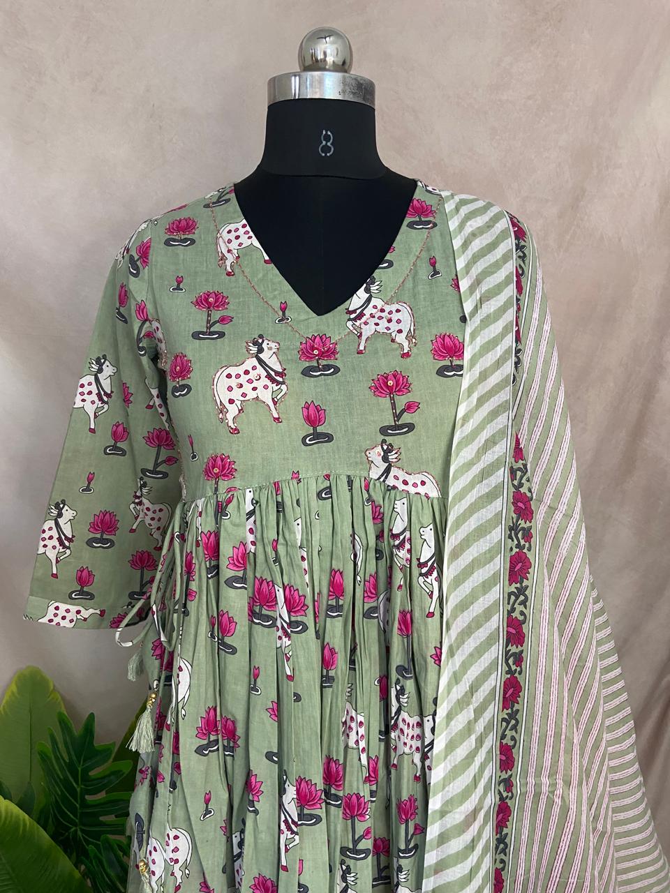 Light green cotton kurti with pitchwai print, bottom and dupatta