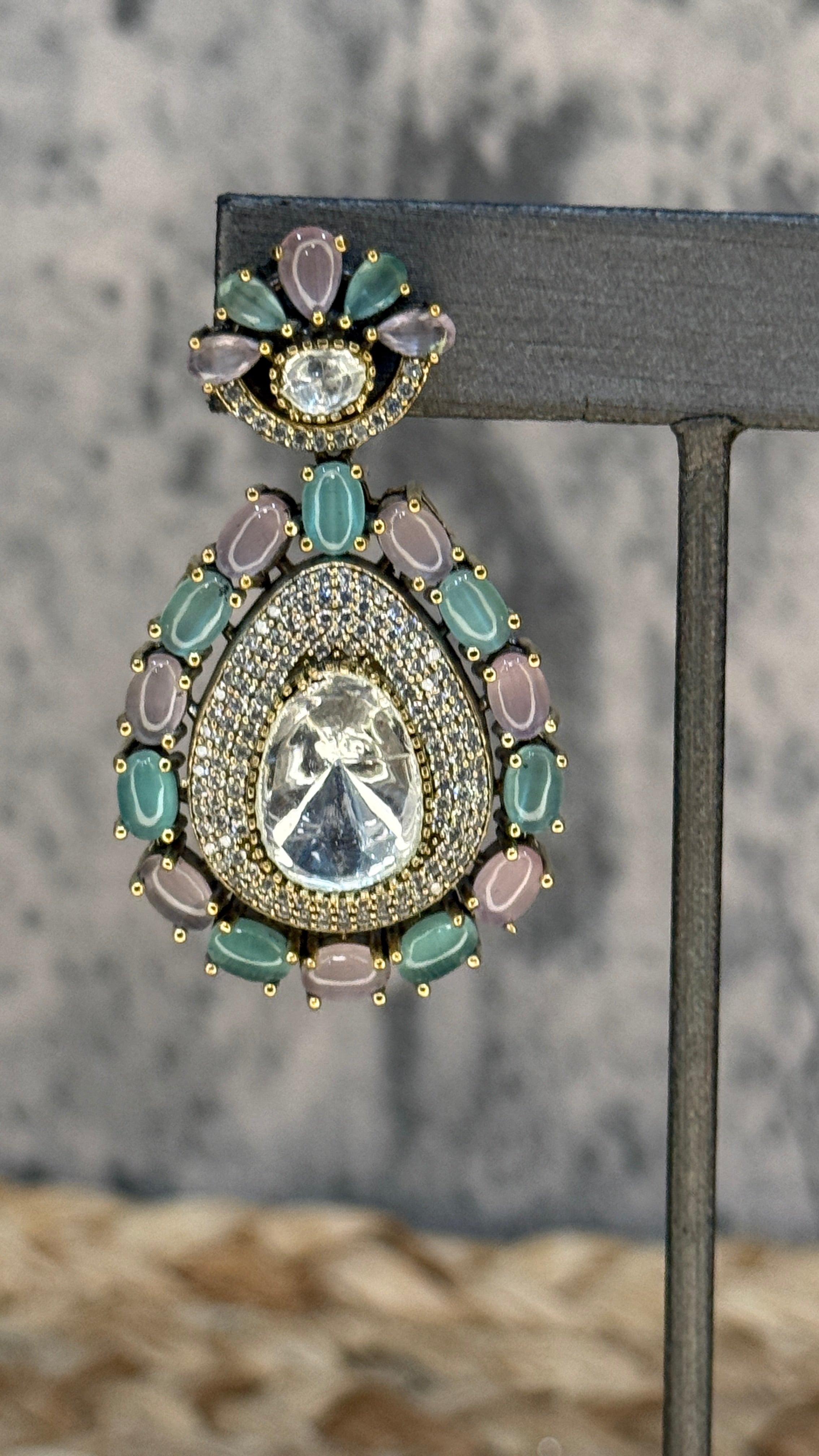 Earring with pastal pink and blue stones