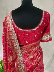 Red and pink combo designer saree with embroidery work and stitched blouse