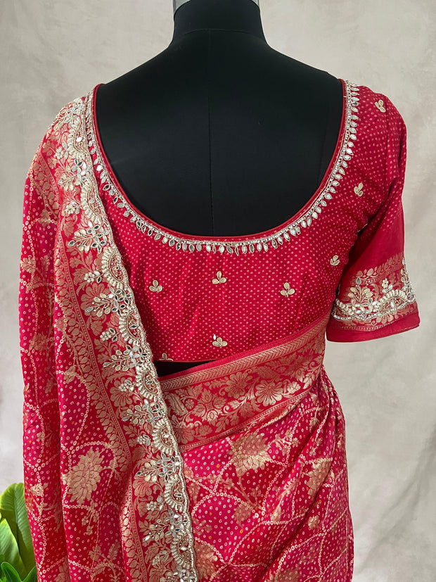 Red and pink combo designer saree with embroidery work and stitched blouse