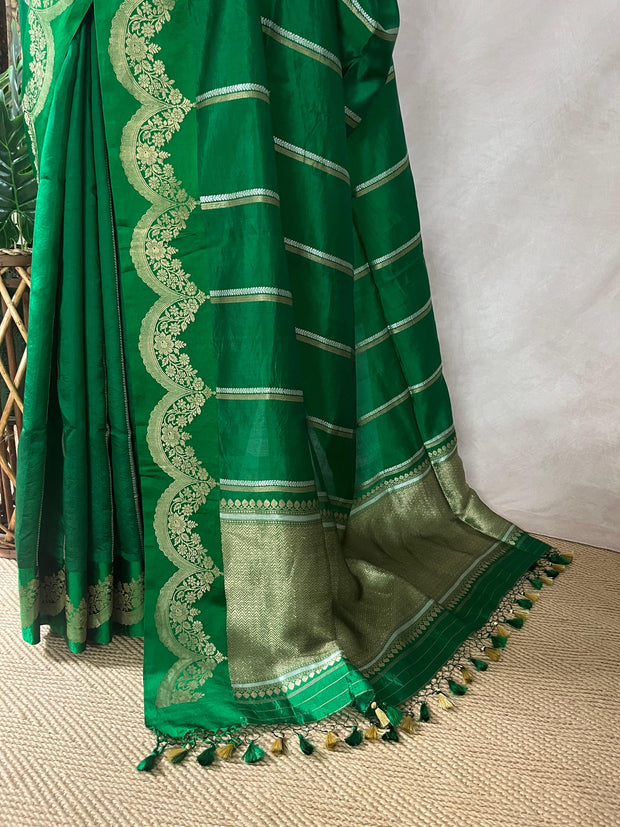 Green soft katan silk saree with silver border, with stitched blouse