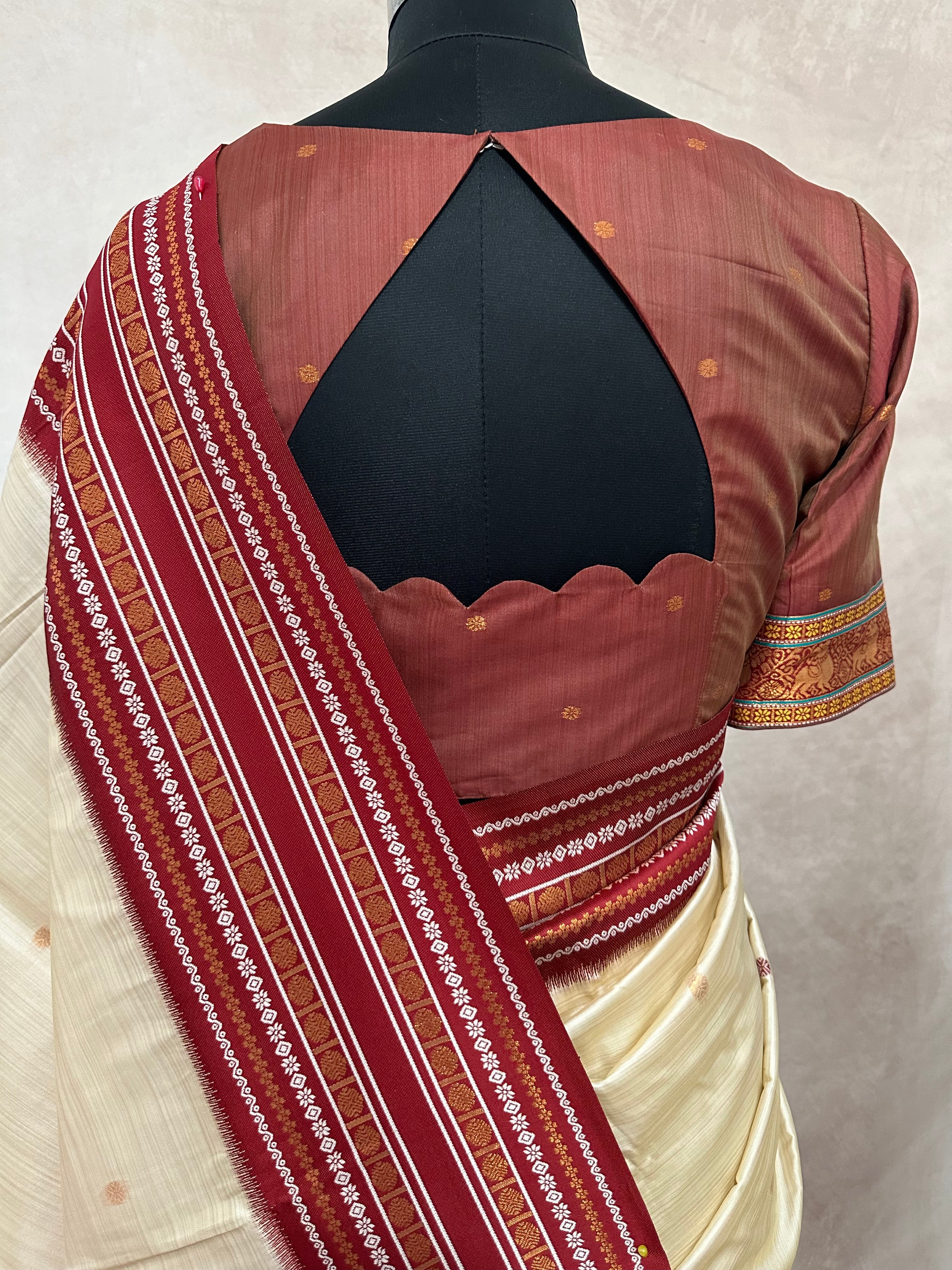Asam silk saree with Red broder and stitched blouse