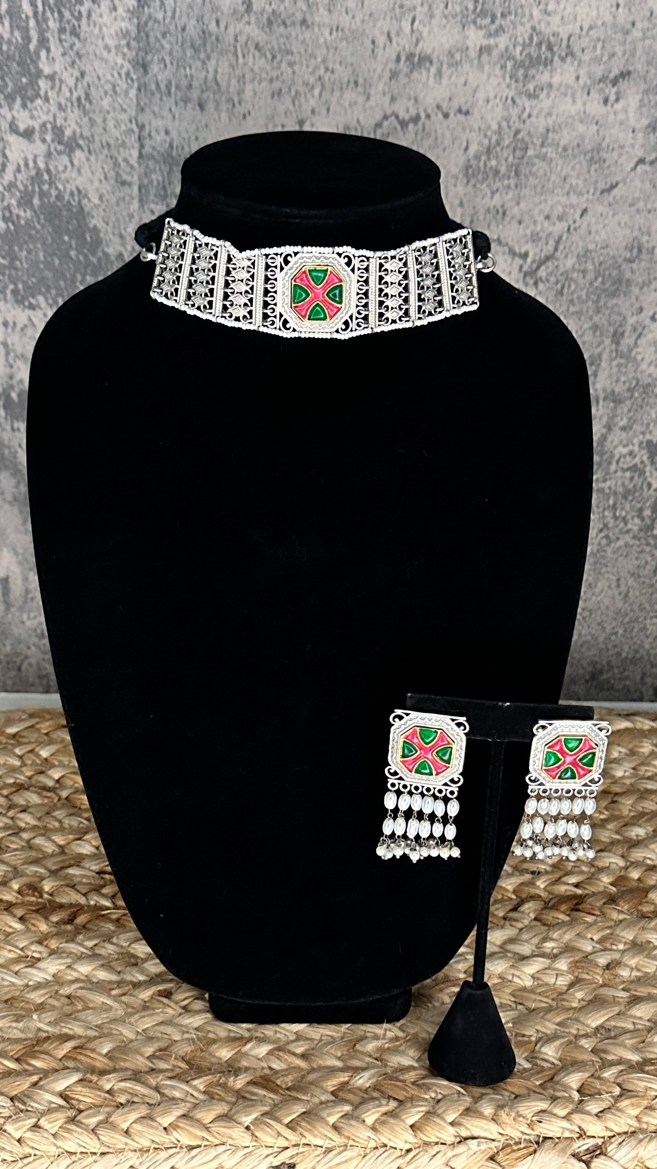 Choker with green and pink stones and studs