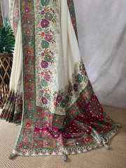Cream munga silk saree with floral weaved border and bead work, comes with stitched blouse