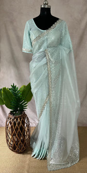 Light blue soft tissue organza designer saree with stitched blouse